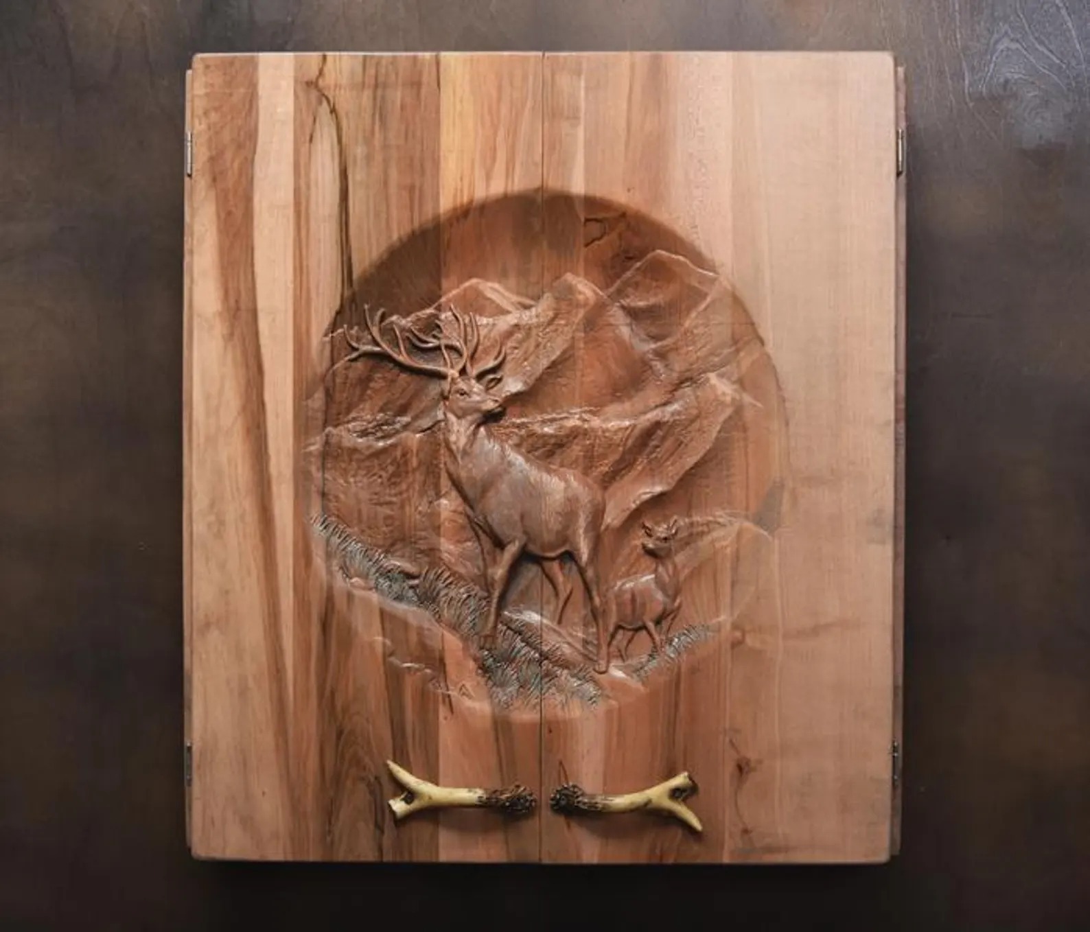 Elk mountain scene — antler handles